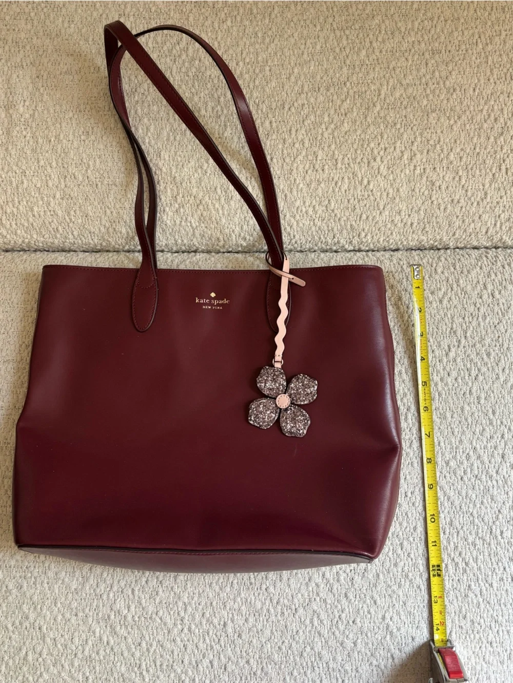 kate spade Burgundy Leather Tote with Floral Charm
